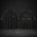 UNFINAL STILL BUILDING oversized black heavyweight tee, front and back